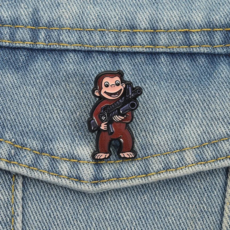 George The Monkey Holding a Gun Enamel Pin