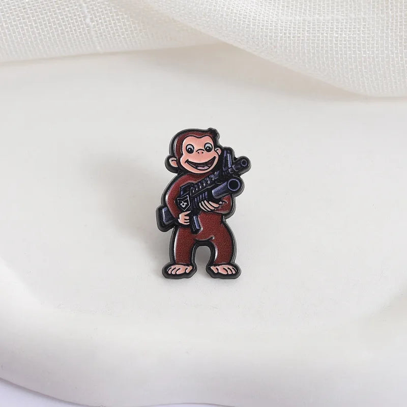 George The Monkey Holding a Gun Enamel Pin