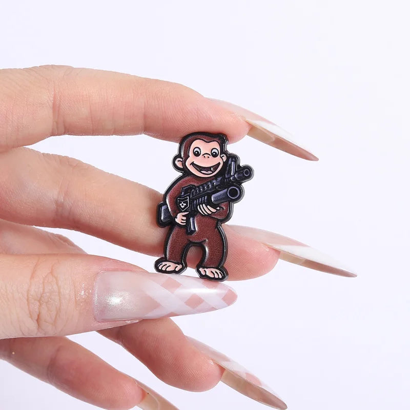 George The Monkey Holding a Gun Enamel Pin