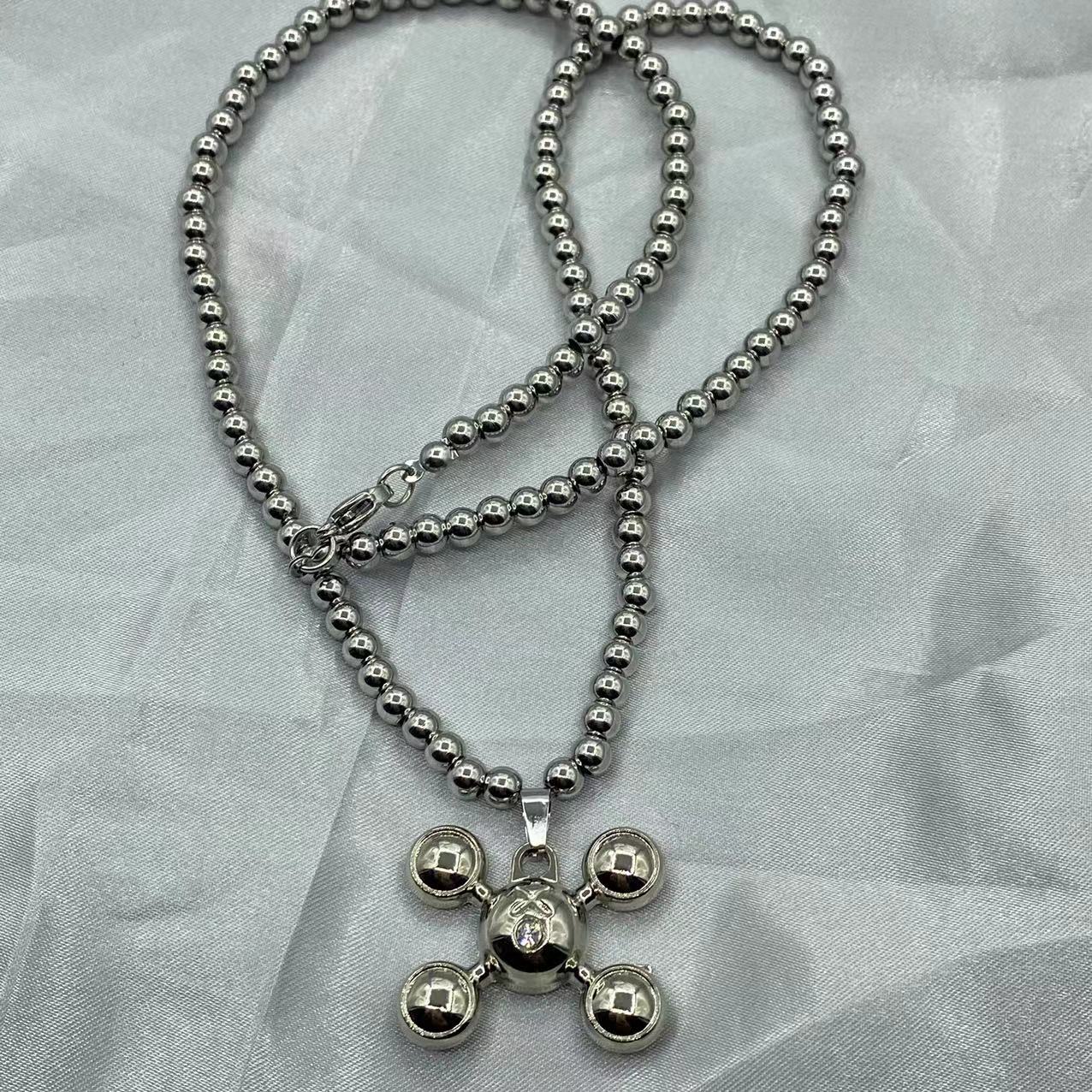 Bubble X Necklace