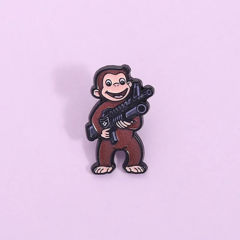 George The Monkey Holding a Gun Enamel Pin