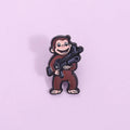 George The Monkey Holding a Gun Enamel Pin