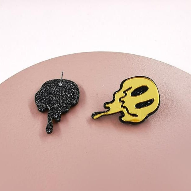 Melted happy face earring