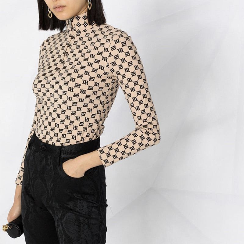 M Monogram Turtleneck Top